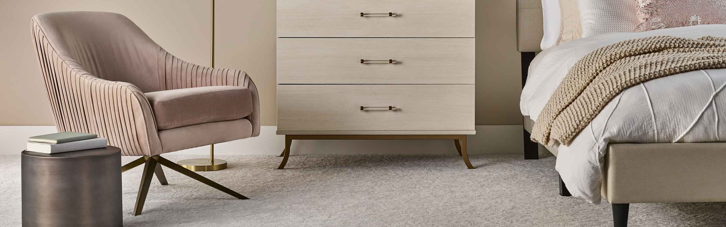 Gray carpet in a bedroom with neutral decor