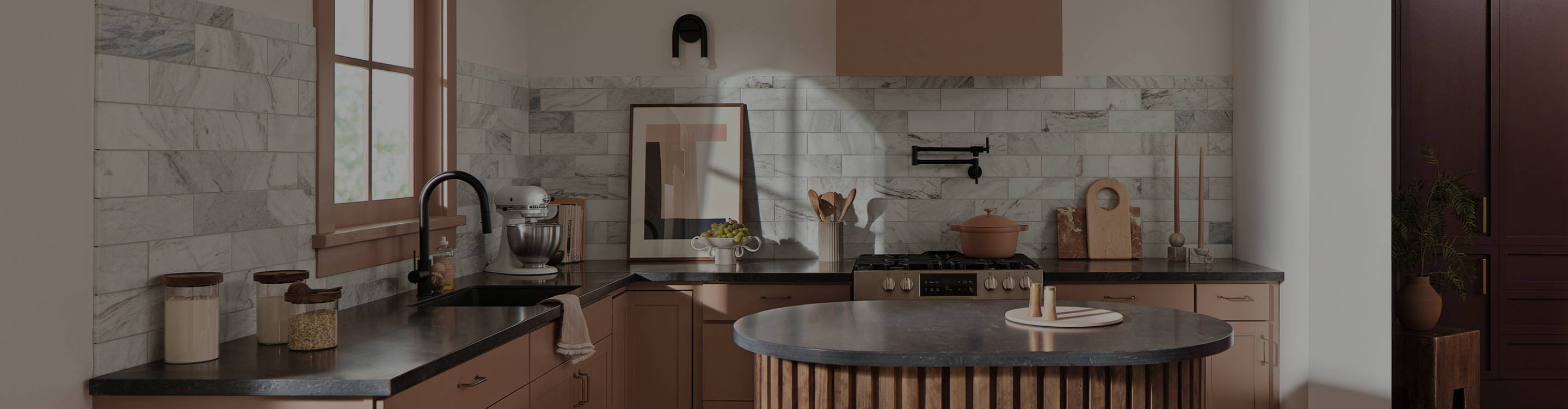 gray and white tile backsplash in a kitchen
